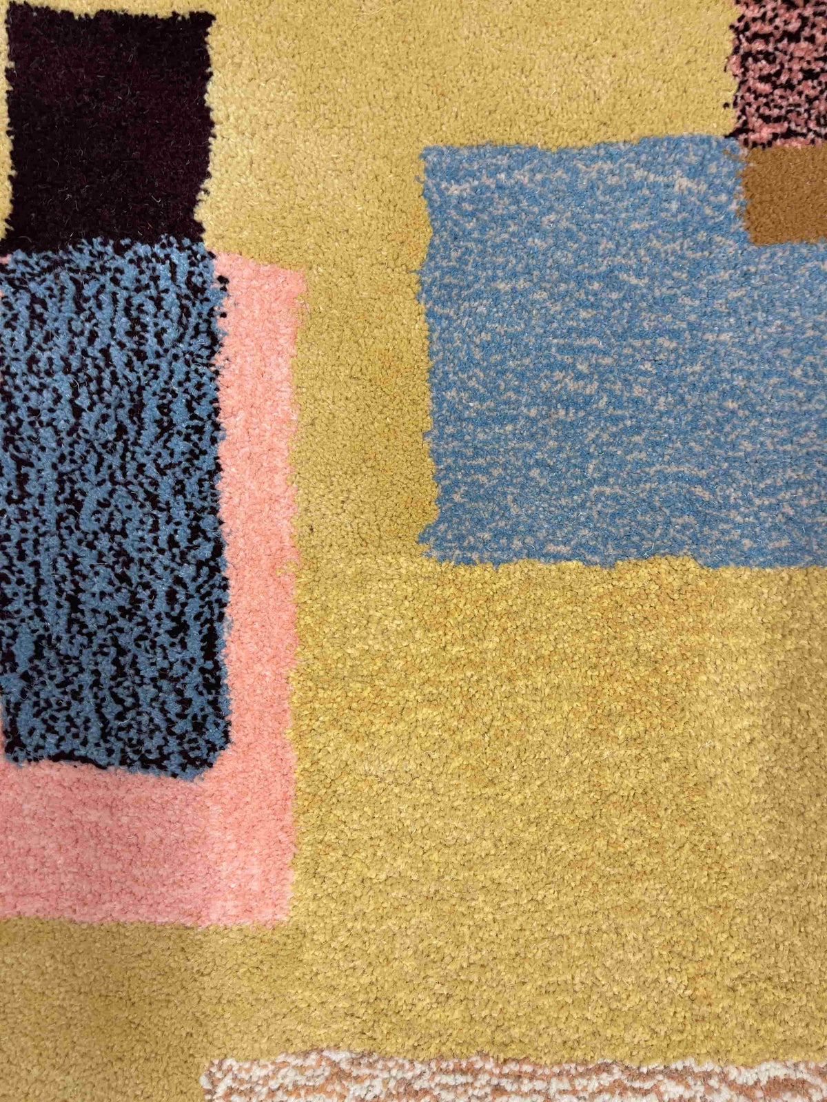 'Shift' Hand tufted butter yellow, pink and blue tufted rug