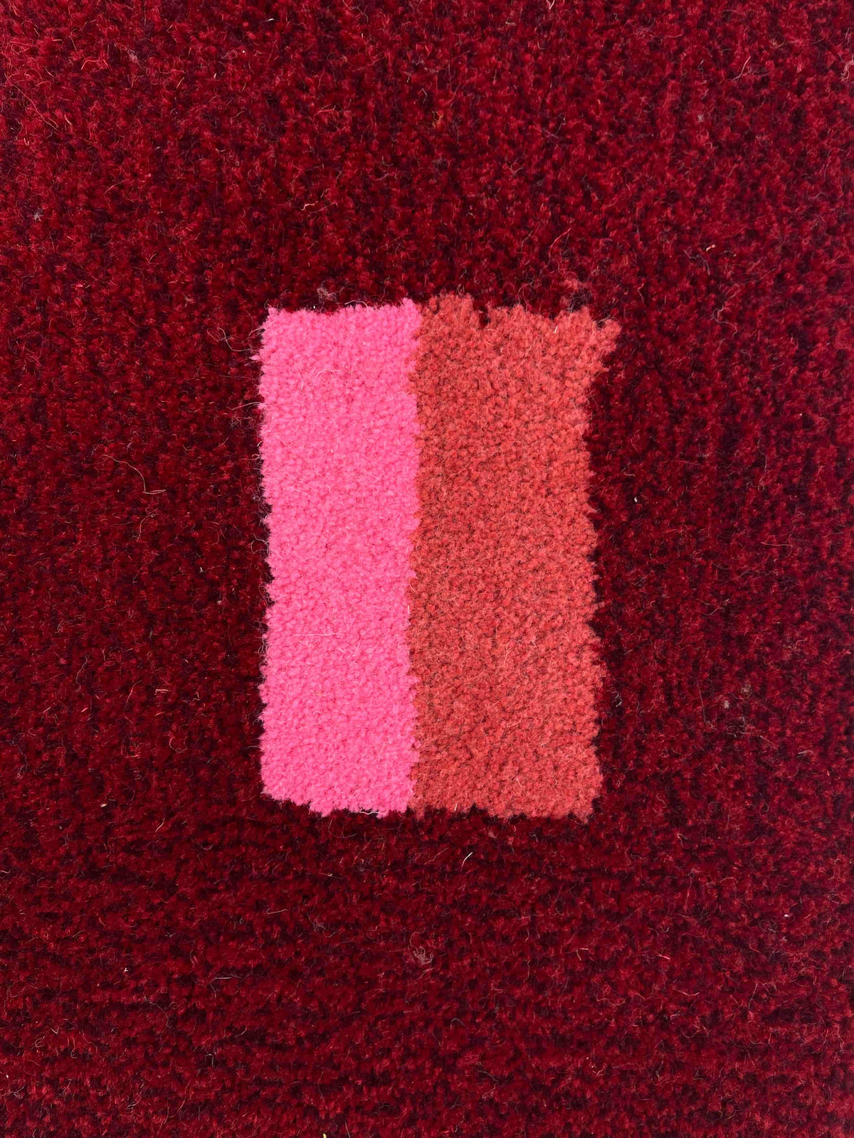 'Mulled' Hand tufted red, pink and burgundy small tufted rug