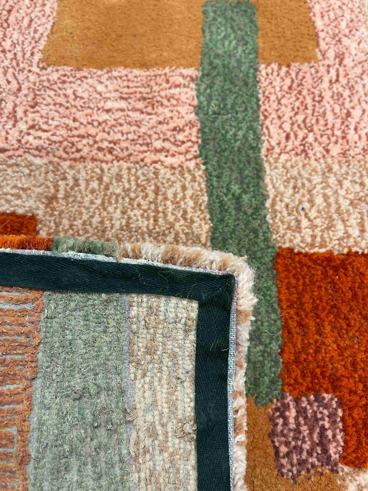 'Quartz' Hand tufted cream, peach, pink and yellow medium tufted rug