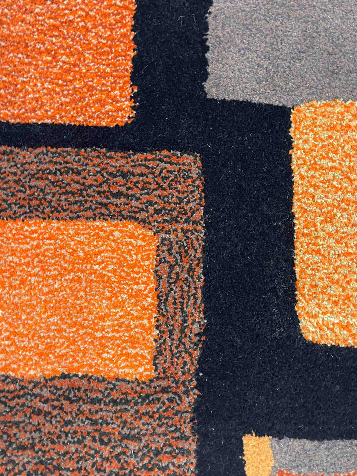 'Thunder' Hand tufted black, orange and mustard tufted rug