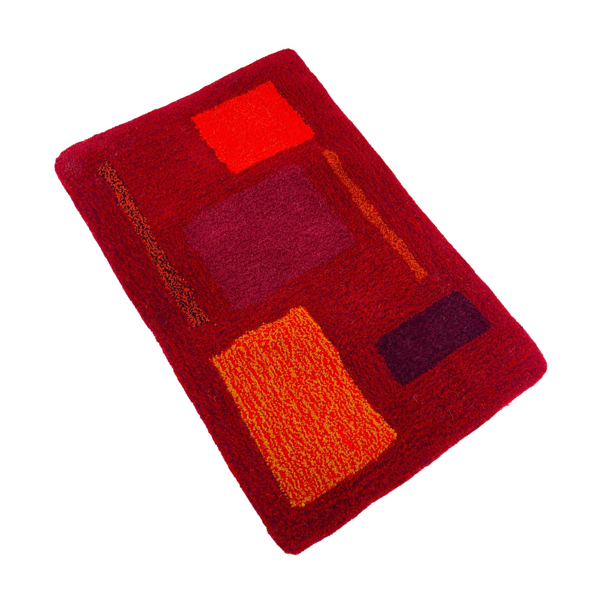 'Flare' Hand tufted burgundy, red and orange small tufted rug