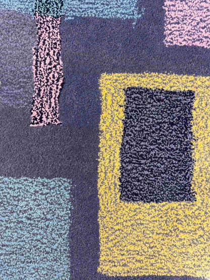 'Smog' Hand tufted grey pastel pink and yellow round small tufted rug